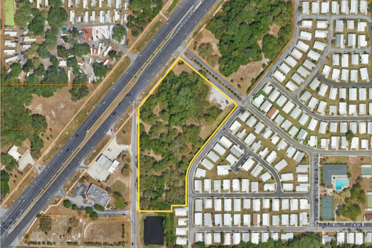 Aerial parcel map showing a commercial development site and nearby roads